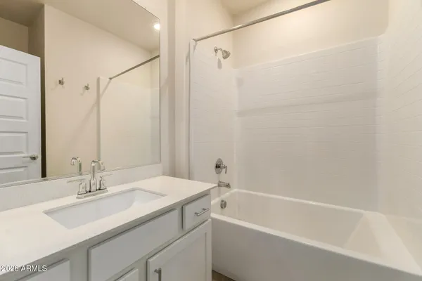 a view of a balcony with car parked