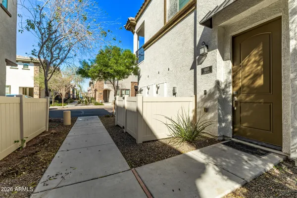 a view of a pathway with a house