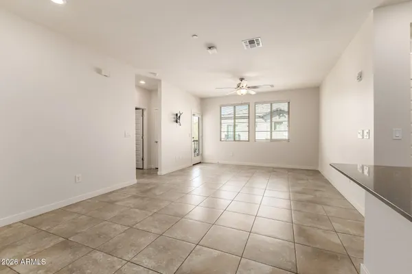 a view of an empty room with a window