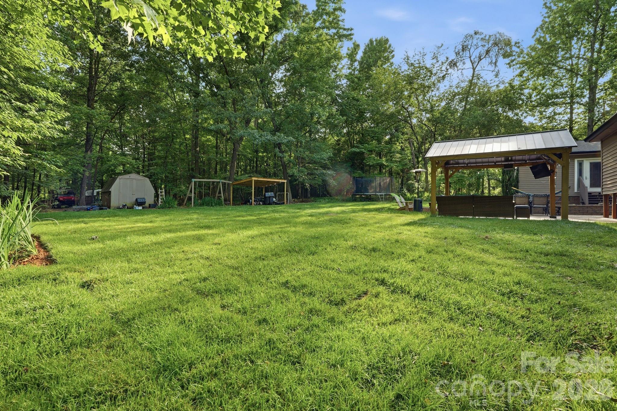 5347 Haney Road York, SC 29745 - Photo 30 of 39 a view of a house with a backyard