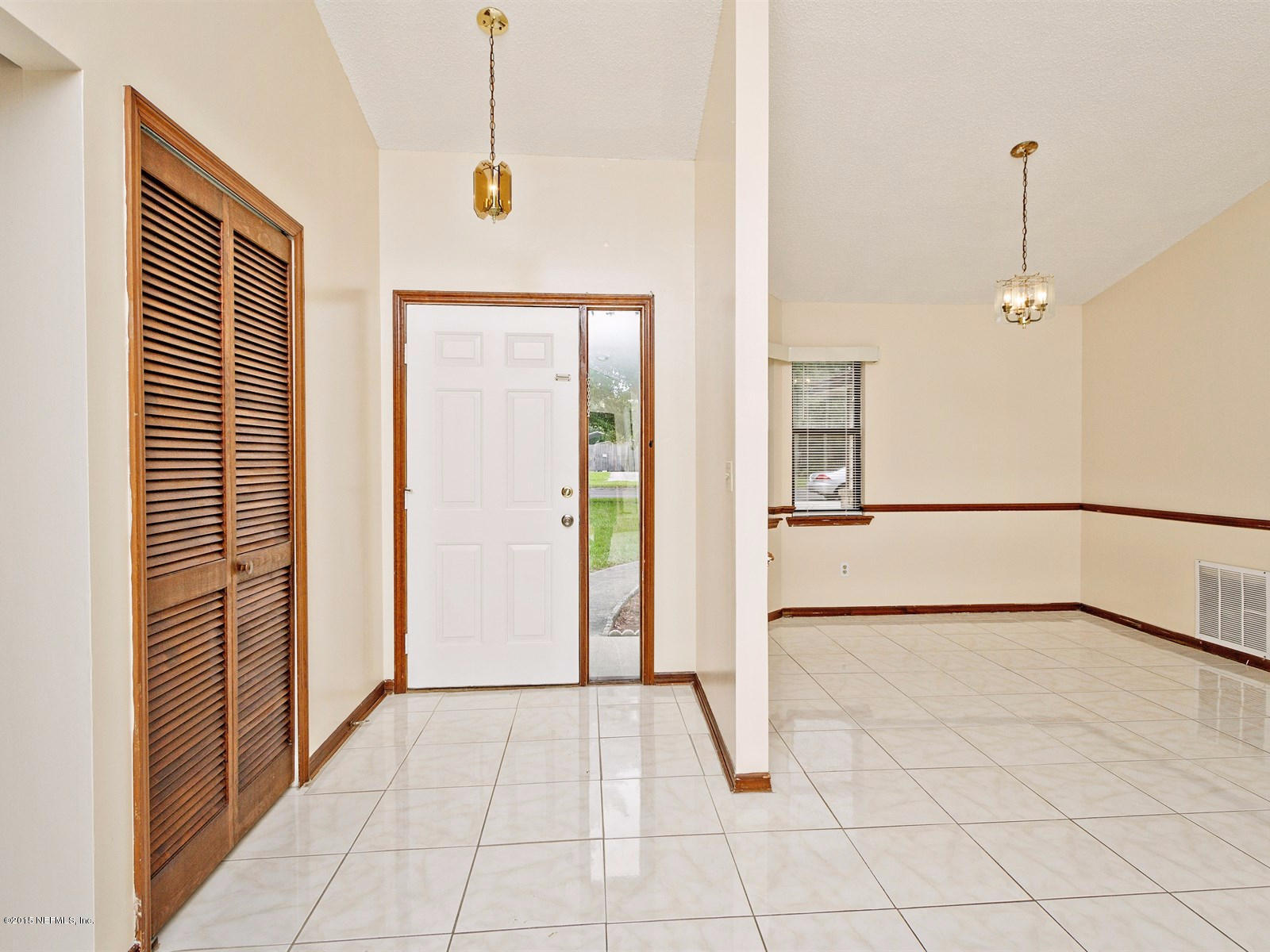 7650 Collins Ridge Boulevard Jacksonville, FL 32244 - Photo 3 of 21 003_FoyerDining Room