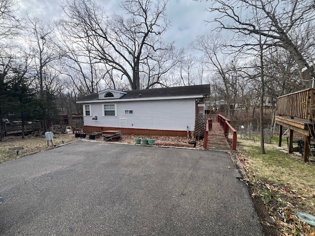 a house view with a backyard space