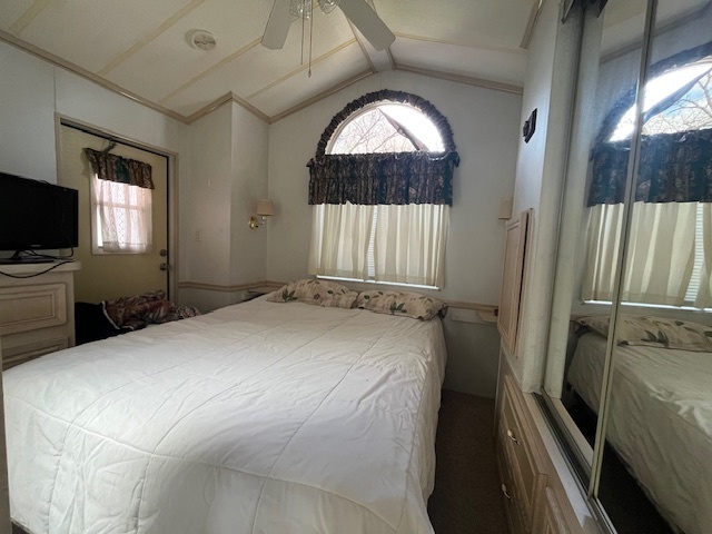 2795 East 28th Road Marseilles, IL 61341 - Photo 13 of 55 a bedroom with a bed and a flat tv screen on the dresser