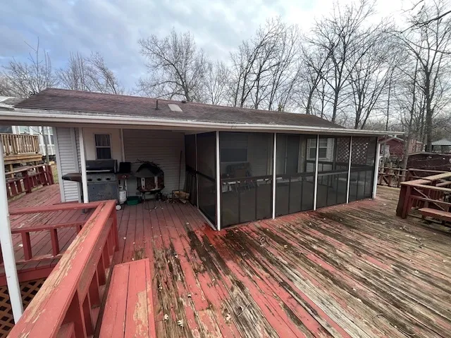 a view of a backyard with sitting area and furniture