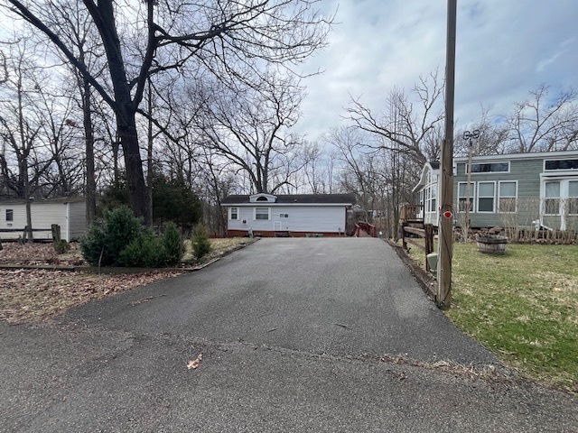2795 East 28th Road Marseilles, IL 61341 - Photo 5 of 55 a view of road with yard and trees