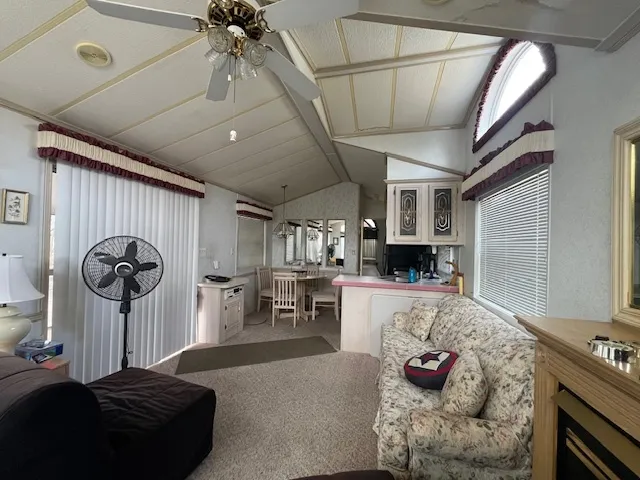 a bedroom with furniture and a fireplace
