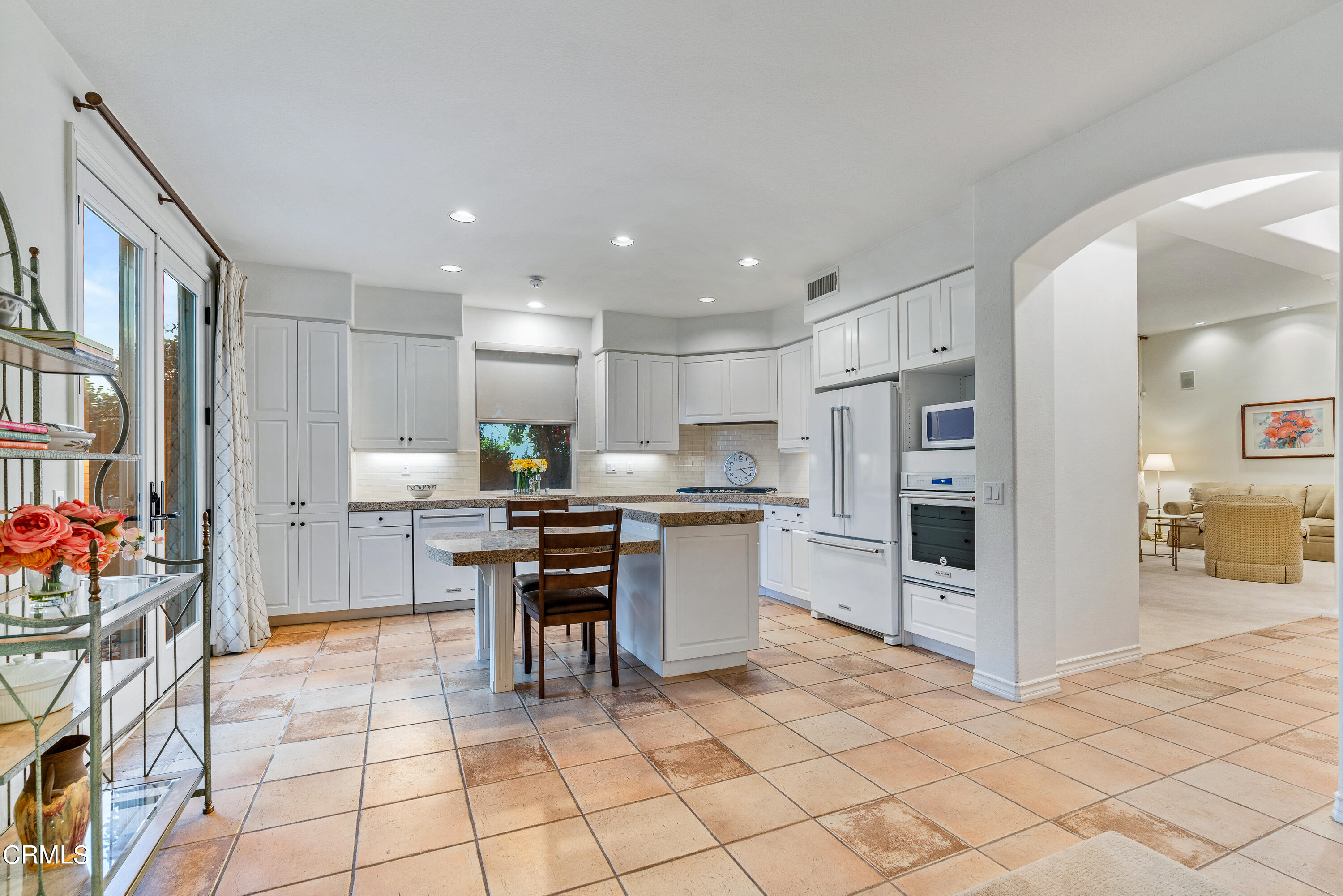 3676 Giddings Ranch Road Altadena, CA 91001 - Photo 8 of 47 a kitchen with stainless steel appliances kitchen island granite countertop a refrigerator and a sink