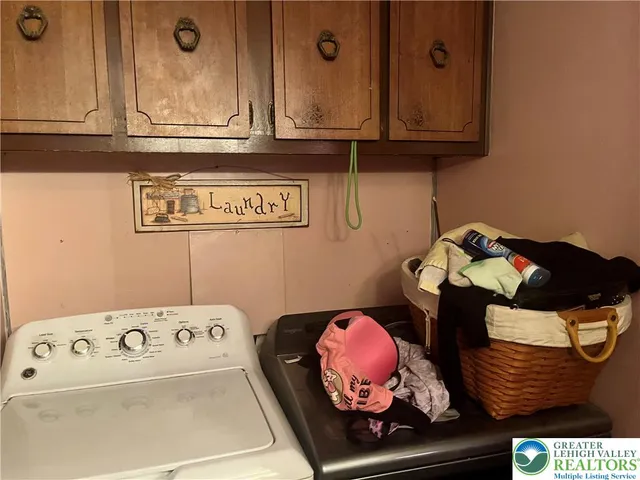 a bathroom with a sink vanity and a mirror