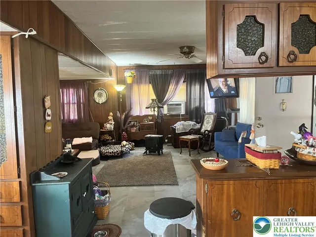 a kitchen with a stove and a refrigerator