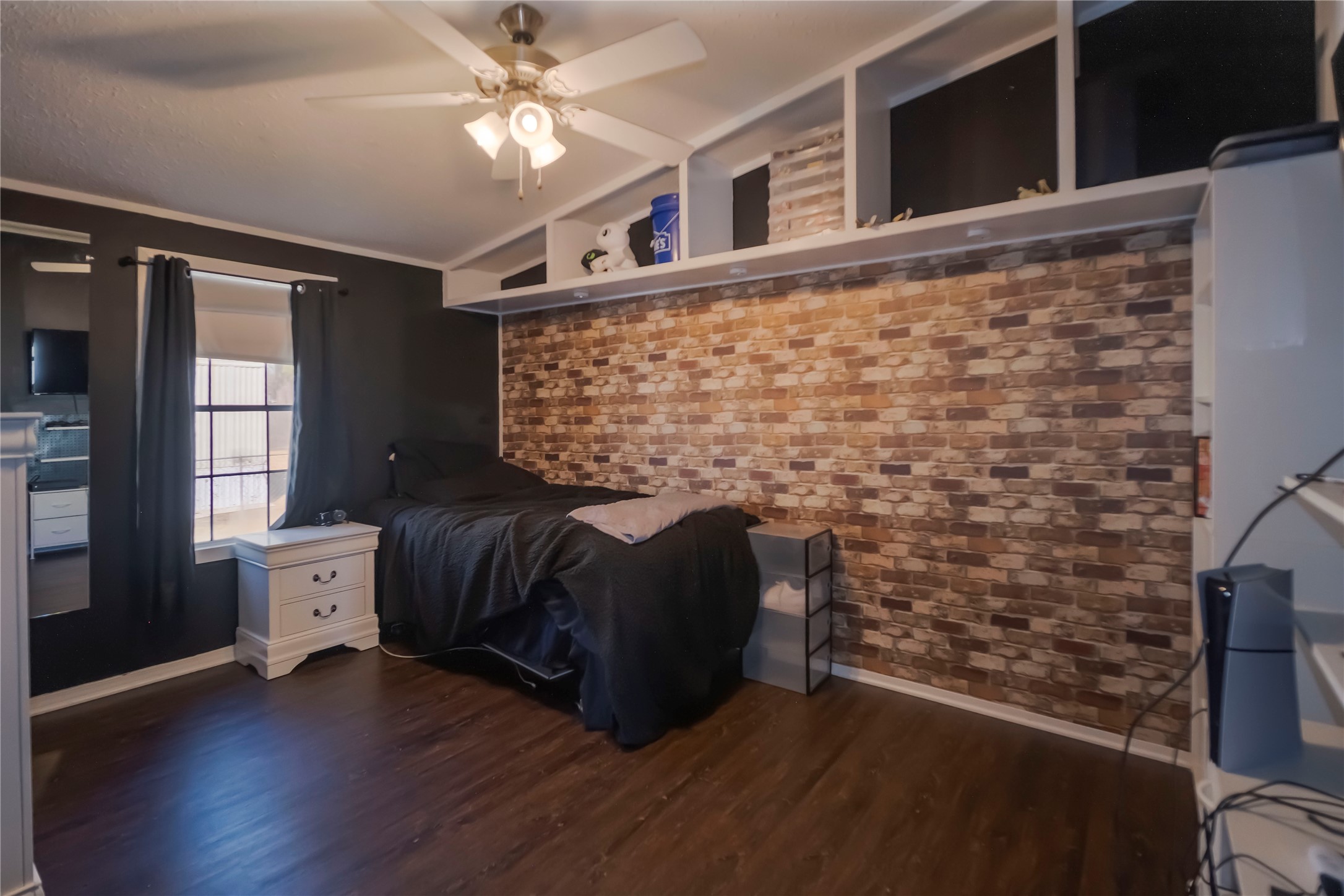 5406 Five Oaks Drive Spring, TX 77389 - Photo 18 of 26 Second bedroom with built in shelving.