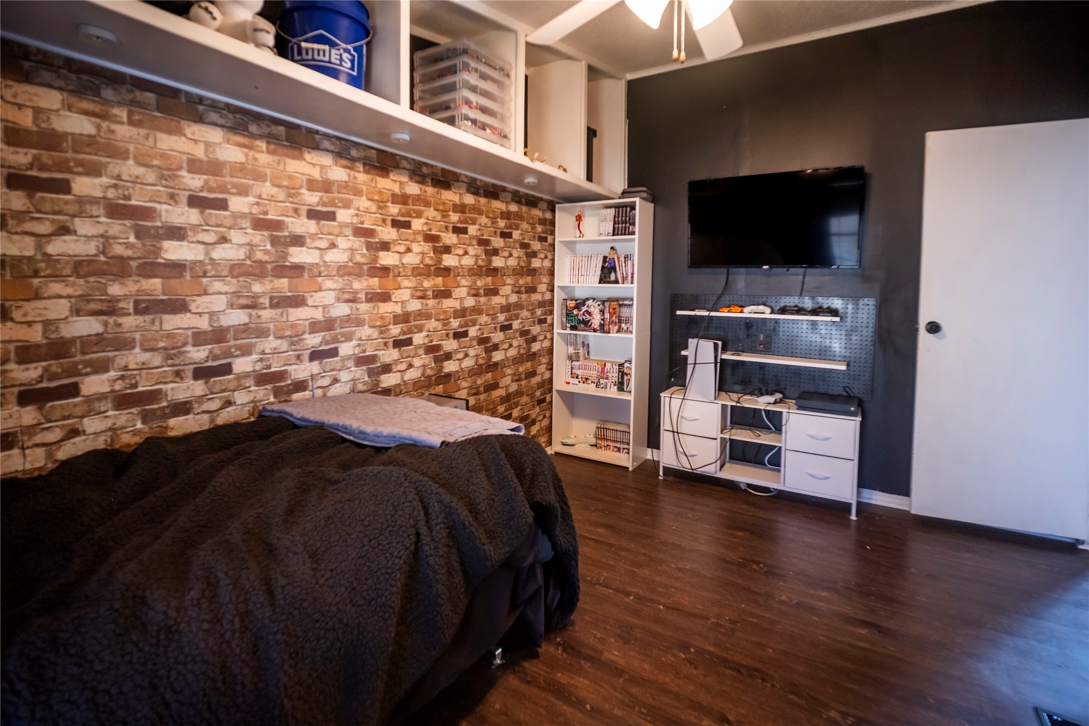 5406 Five Oaks Drive Spring, TX 77389 - Photo 19 of 26 Fuax brick accent wall.