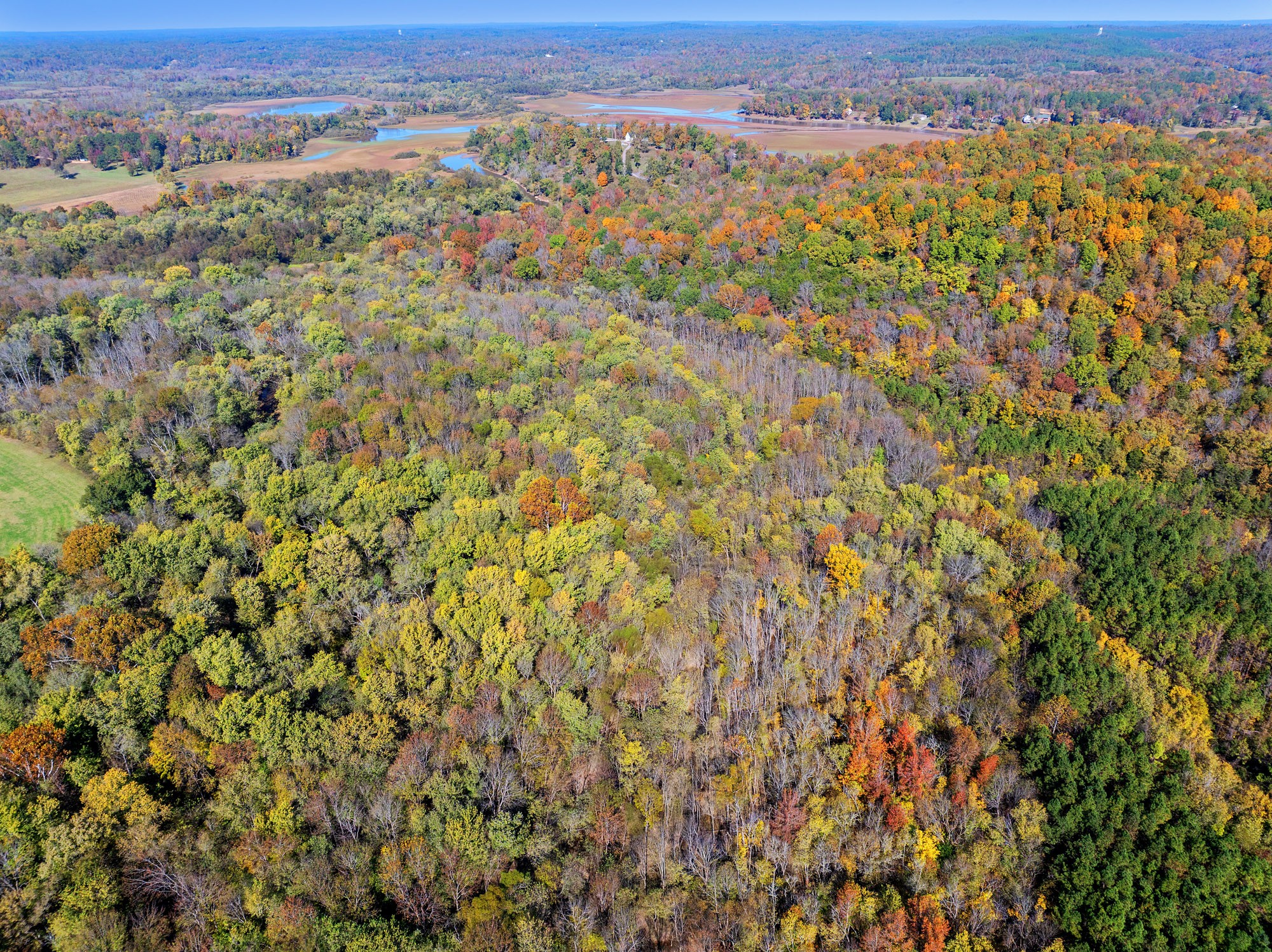 0 Dr Fisher Lane Decaturville, TN 38329 - Photo 20 of 25 an aerial view of residential houses with outdoor space and trees