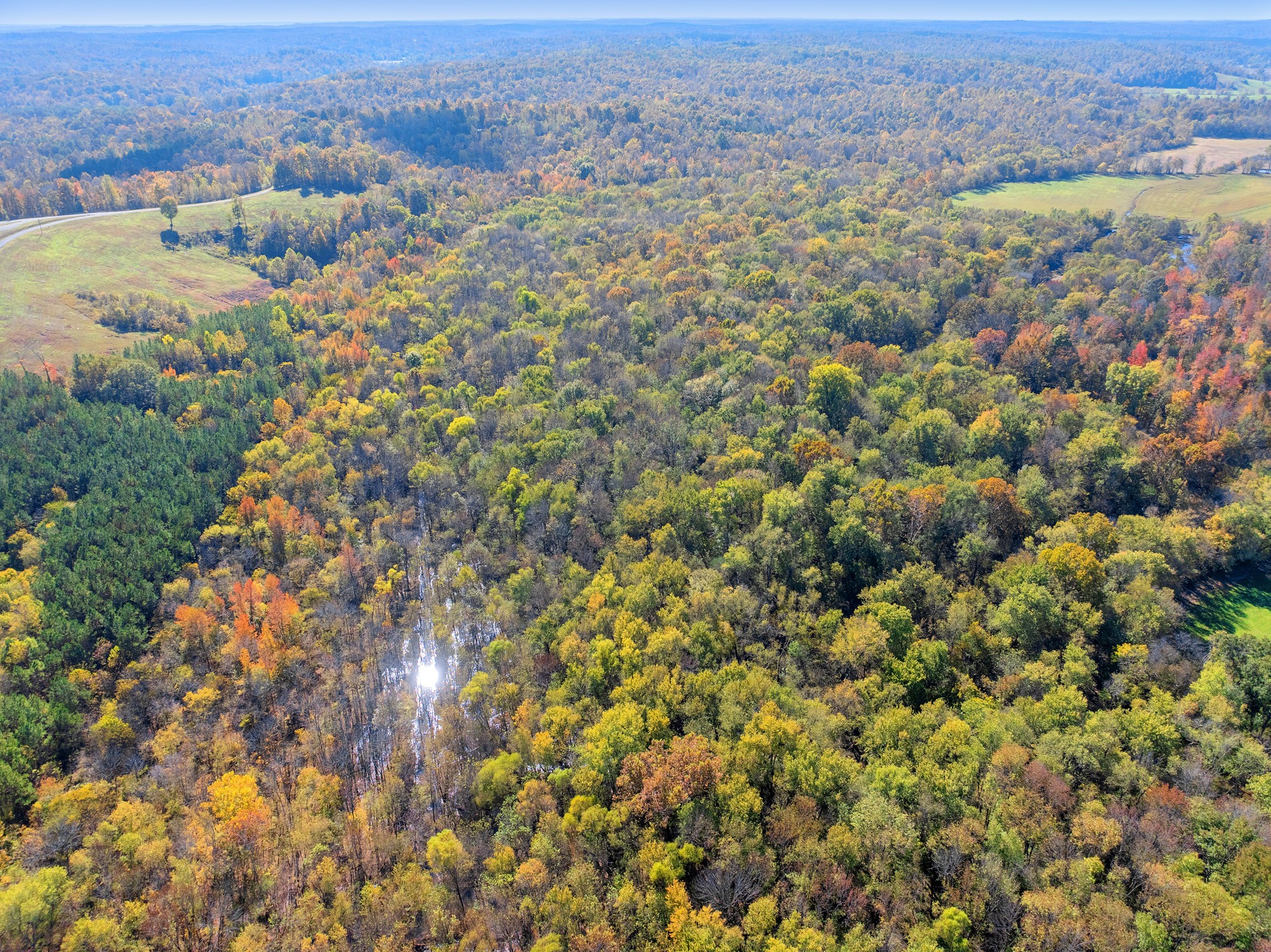 0 Dr Fisher Lane Decaturville, TN 38329 - Photo 8 of 25 an aerial view of residential houses with outdoor space and trees