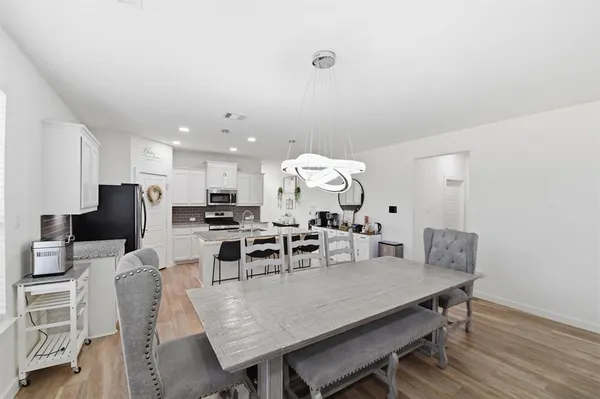 a view of a dining room with furniture