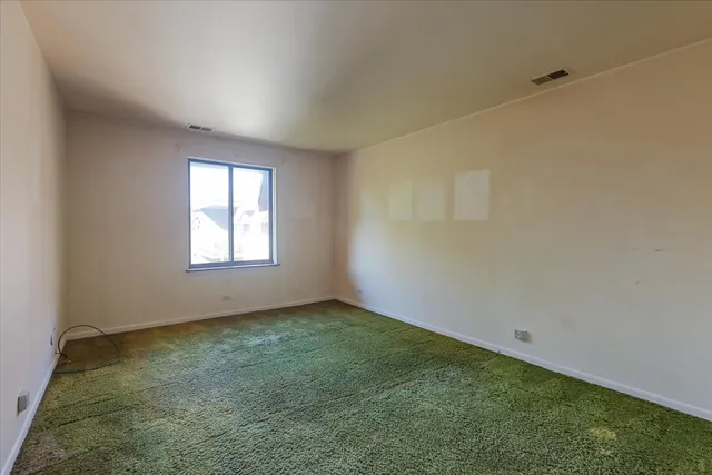 a view of an empty room with window