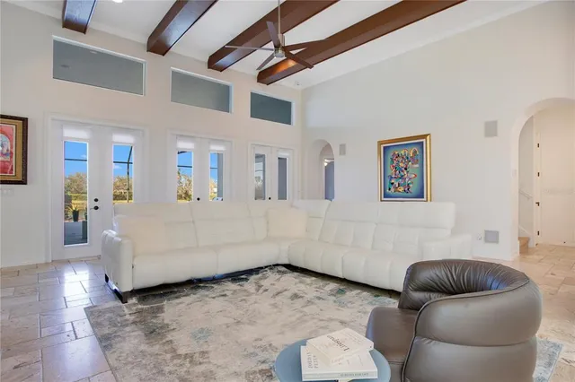 a living room with furniture and a rug