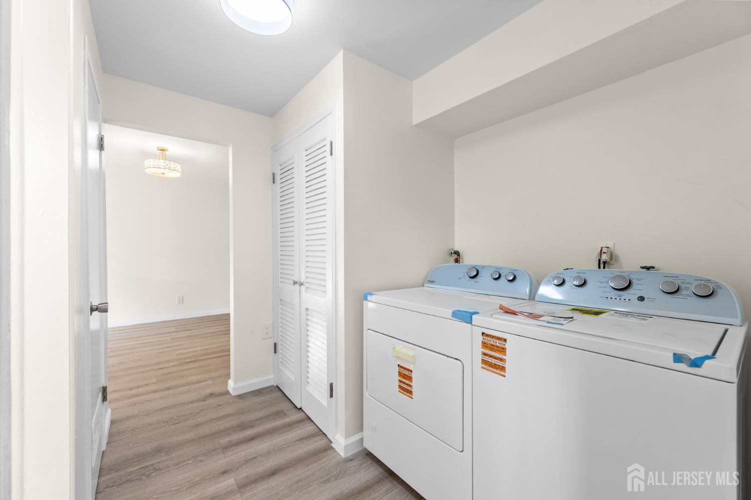 41 Raleigh Road Kendall Park, NJ 08824 - Photo 17 of 40 a utility room with dryer and washer