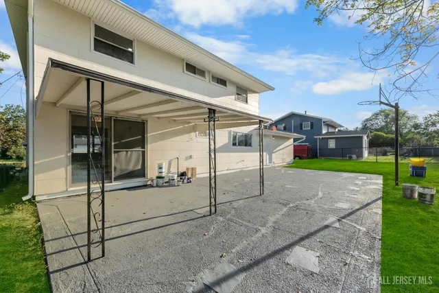 a view of a house with a street