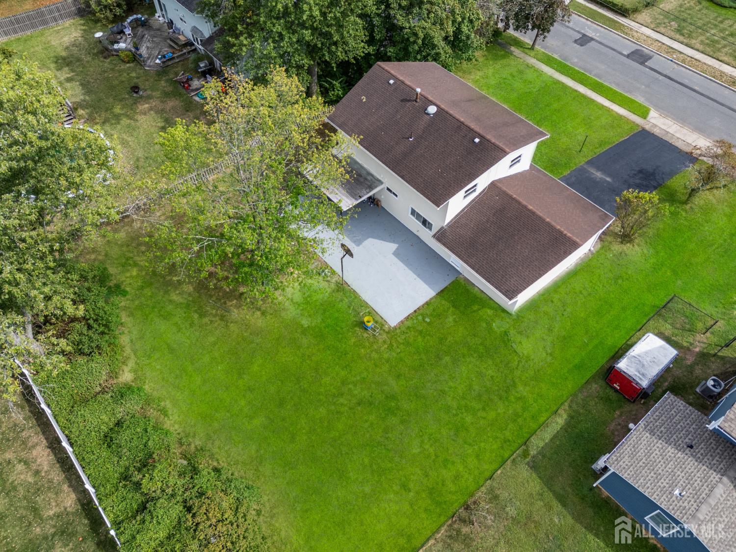 41 Raleigh Road Kendall Park, NJ 08824 - Photo 36 of 40 an aerial view of a house with a yard
