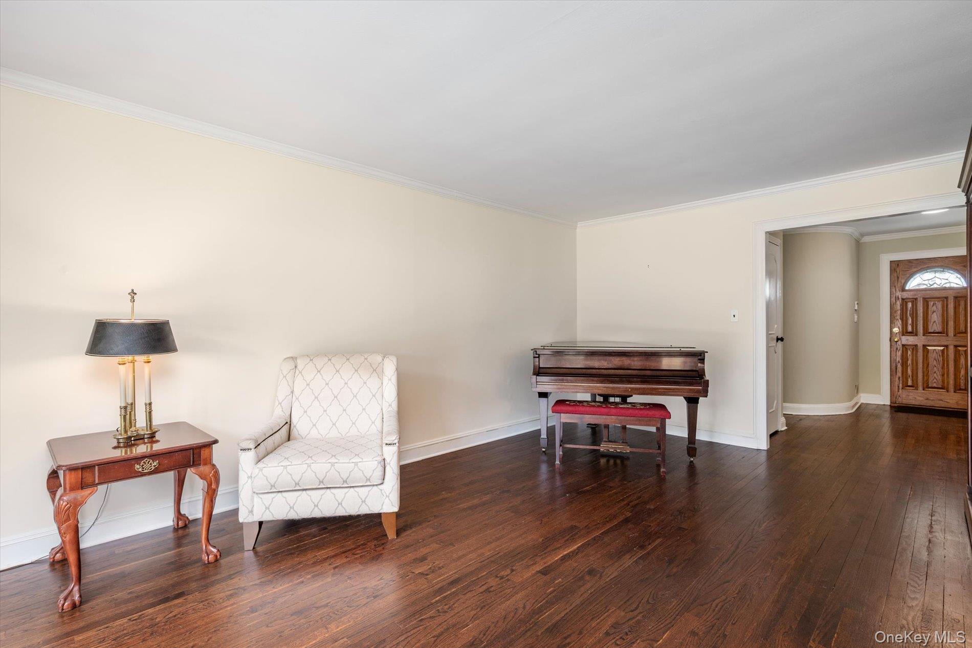 60 Ridge Drive Plainview, NY 11803 - Photo 13 of 27 a room with furniture and a wooden floor