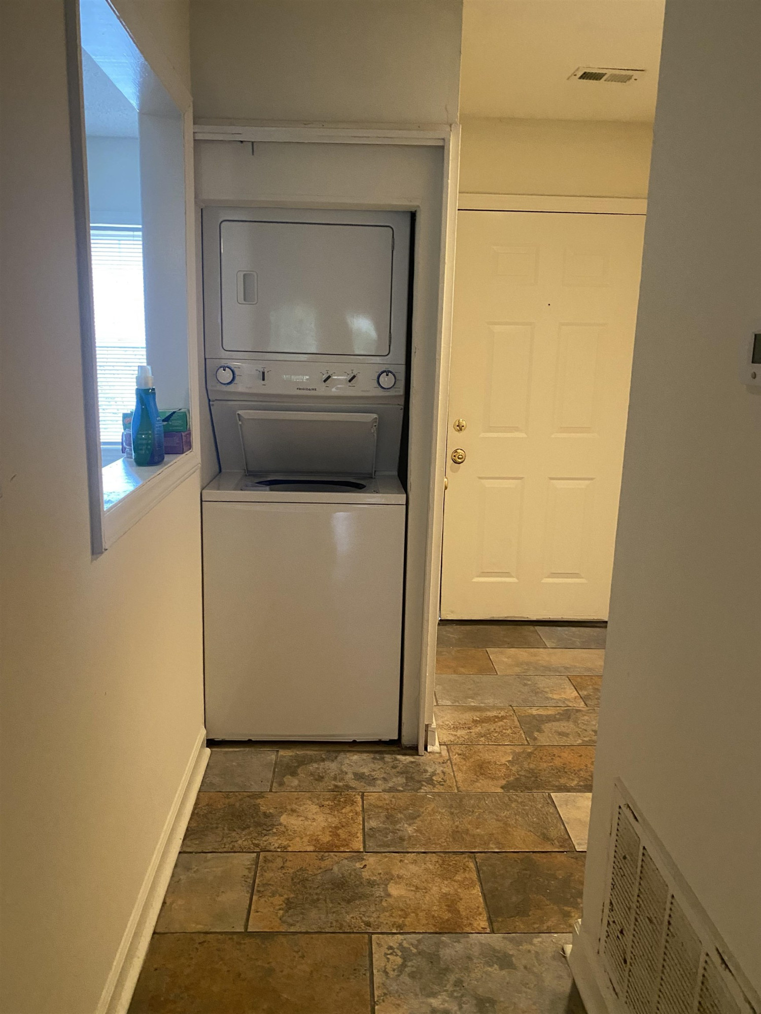 2500 Avent Ferry Road, Unit 205 Raleigh, NC 27606 - Photo 3 of 26 a utility room with a washer and dryer