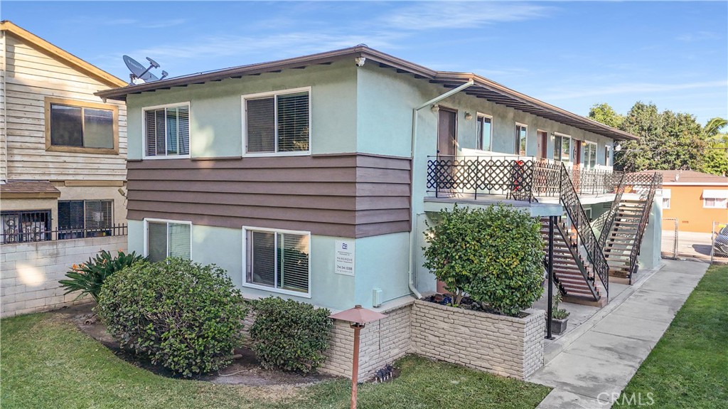 7336 Pickering Avenue Whittier, CA 90602 - Photo 1 of 3 a view of a house with a yard and plants