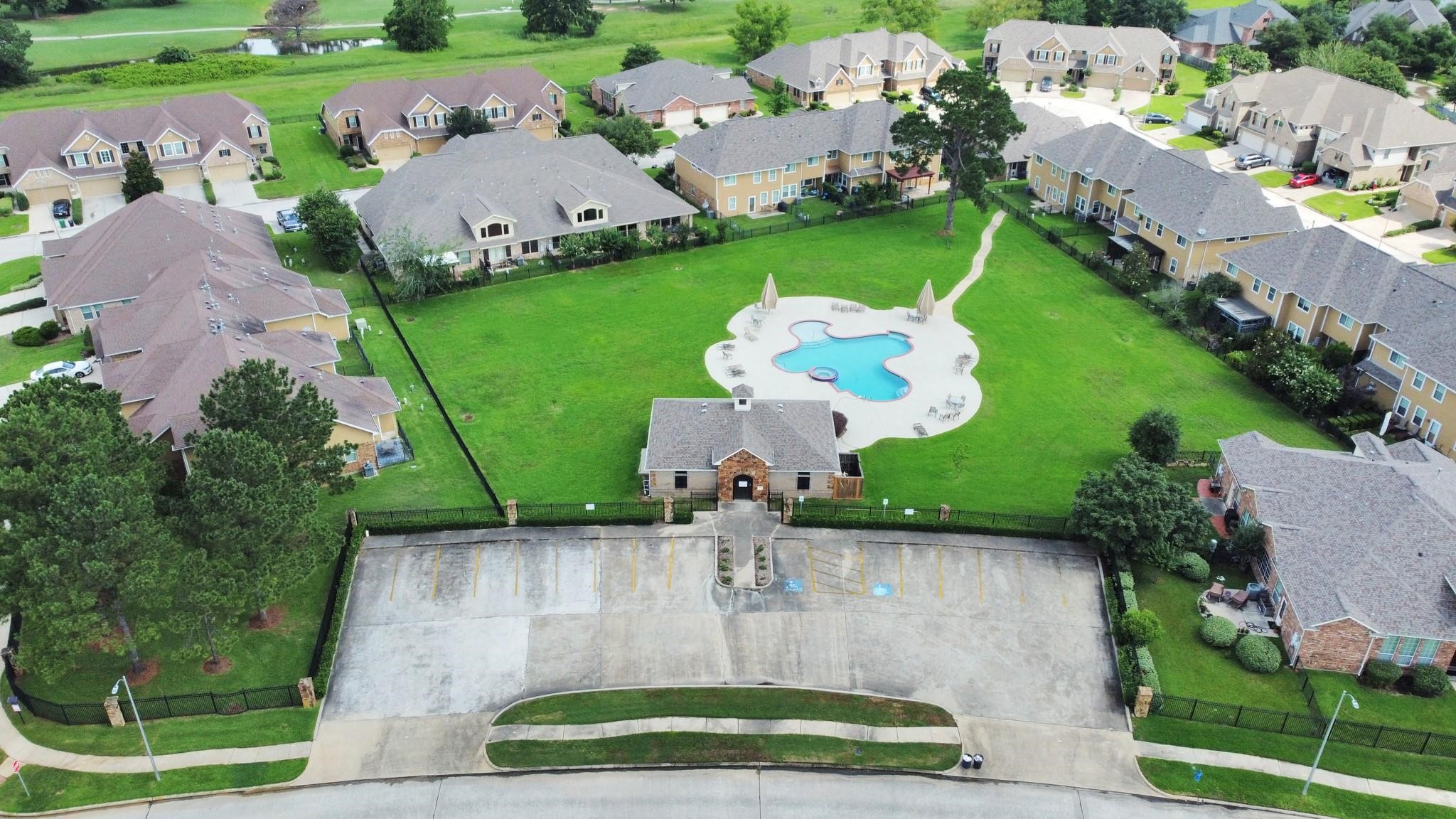 8624 Sunset Loch Drive Spring, TX 77379 - Photo 41 of 44 an aerial view of a house with a garden and outdoor seating