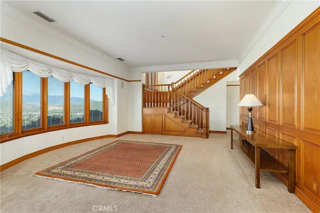 a bedroom with a bed a desk and chair