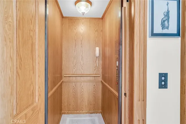 a view of elevator with hallway