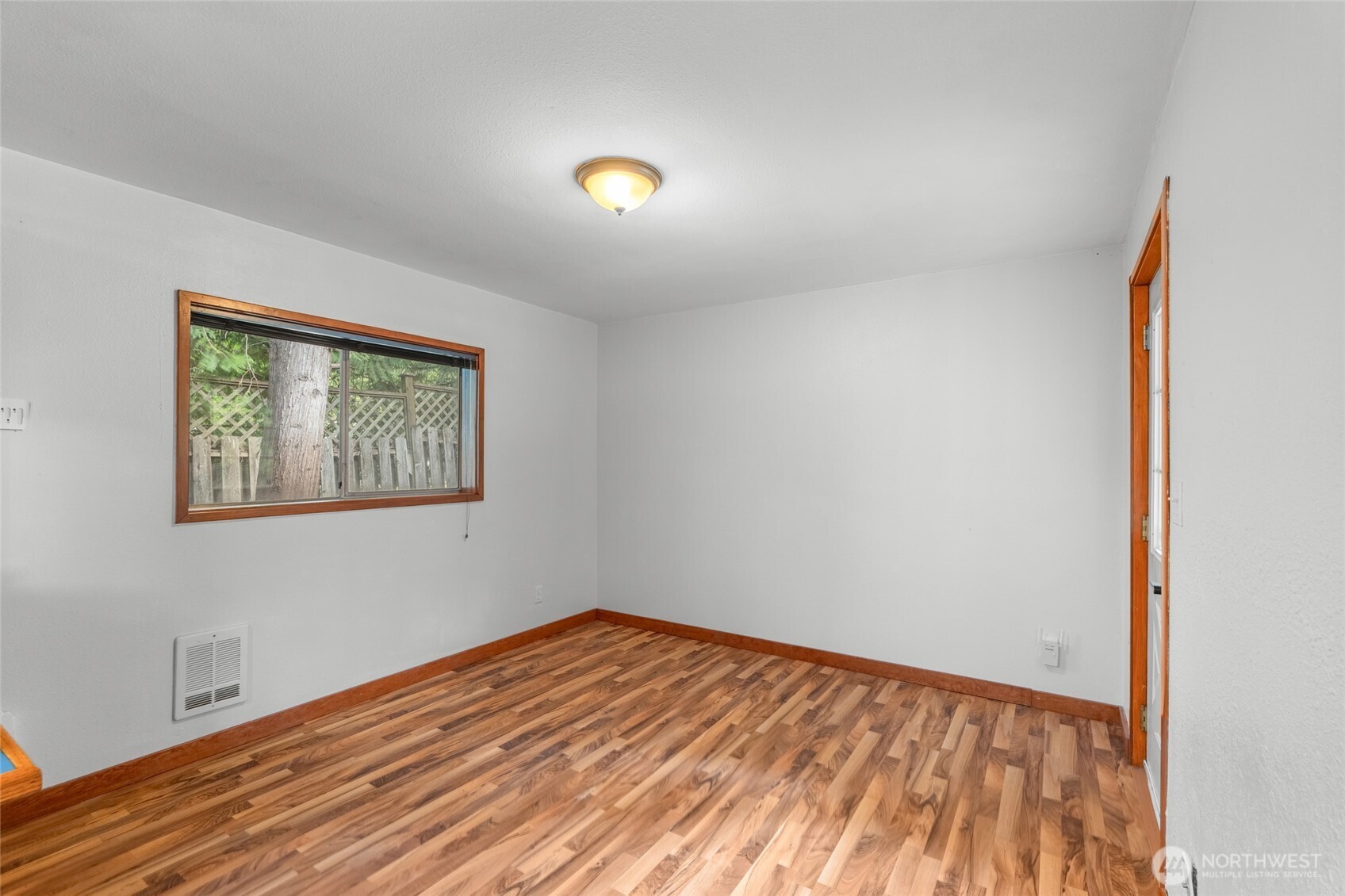 230 East Stavis Road Shelton, WA 98584 - Photo 13 of 35 a view of empty room with wooden floor