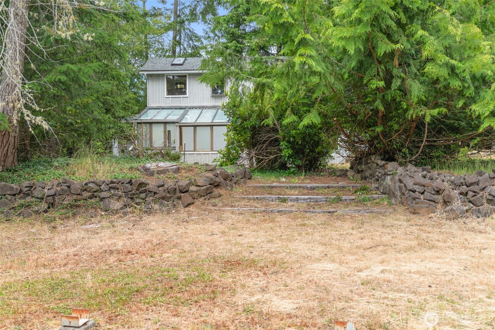 230 East Stavis Road Shelton, WA 98584 - Photo 27 of 35 a view of a house with a yard