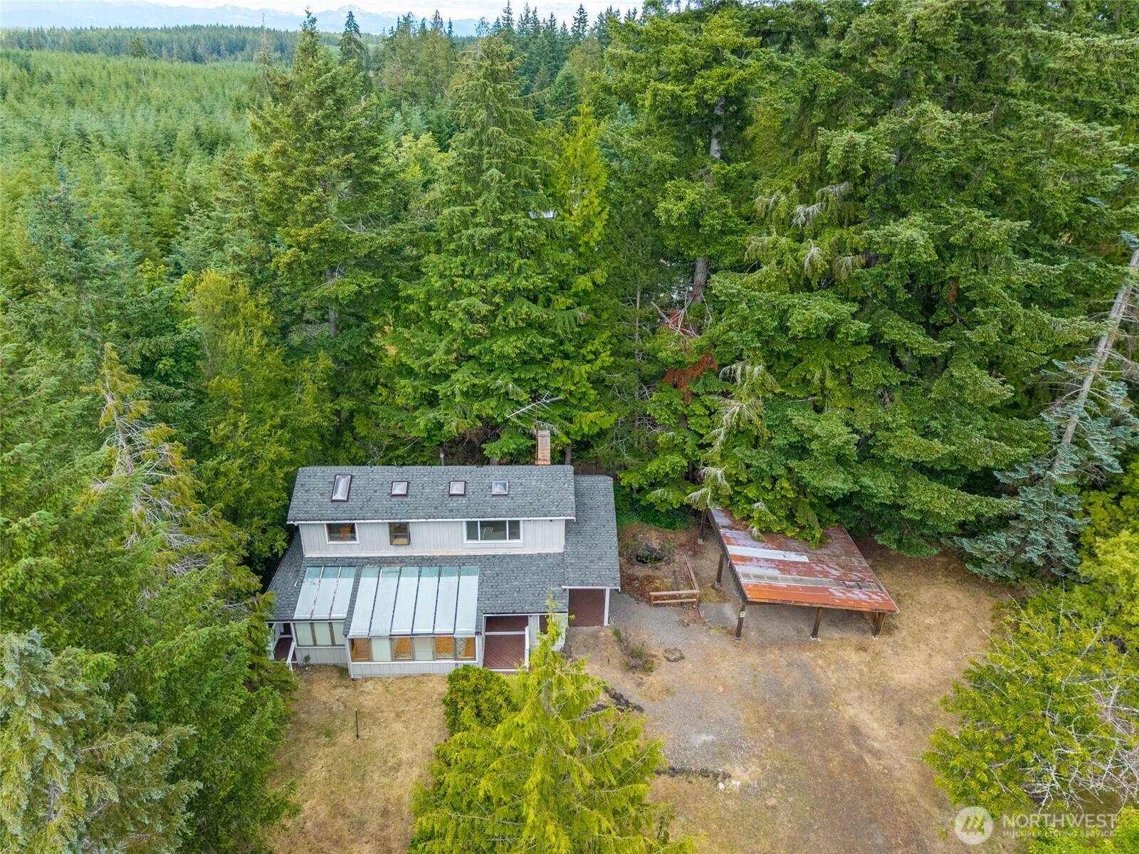 230 East Stavis Road Shelton, WA 98584 - Photo 30 of 35 an aerial view of a house with a yard