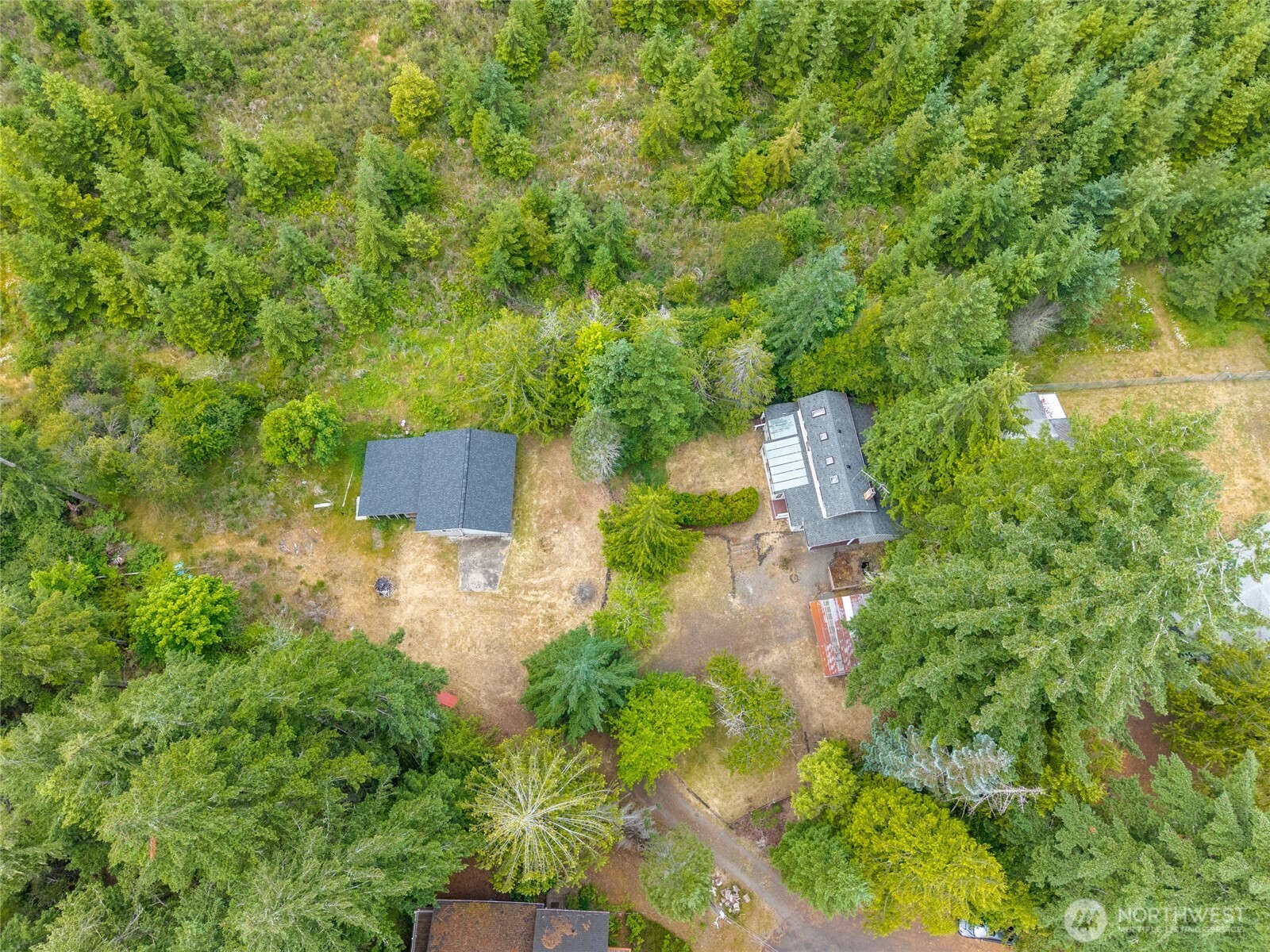 230 East Stavis Road Shelton, WA 98584 - Photo 31 of 35 an aerial view of a house with a yard