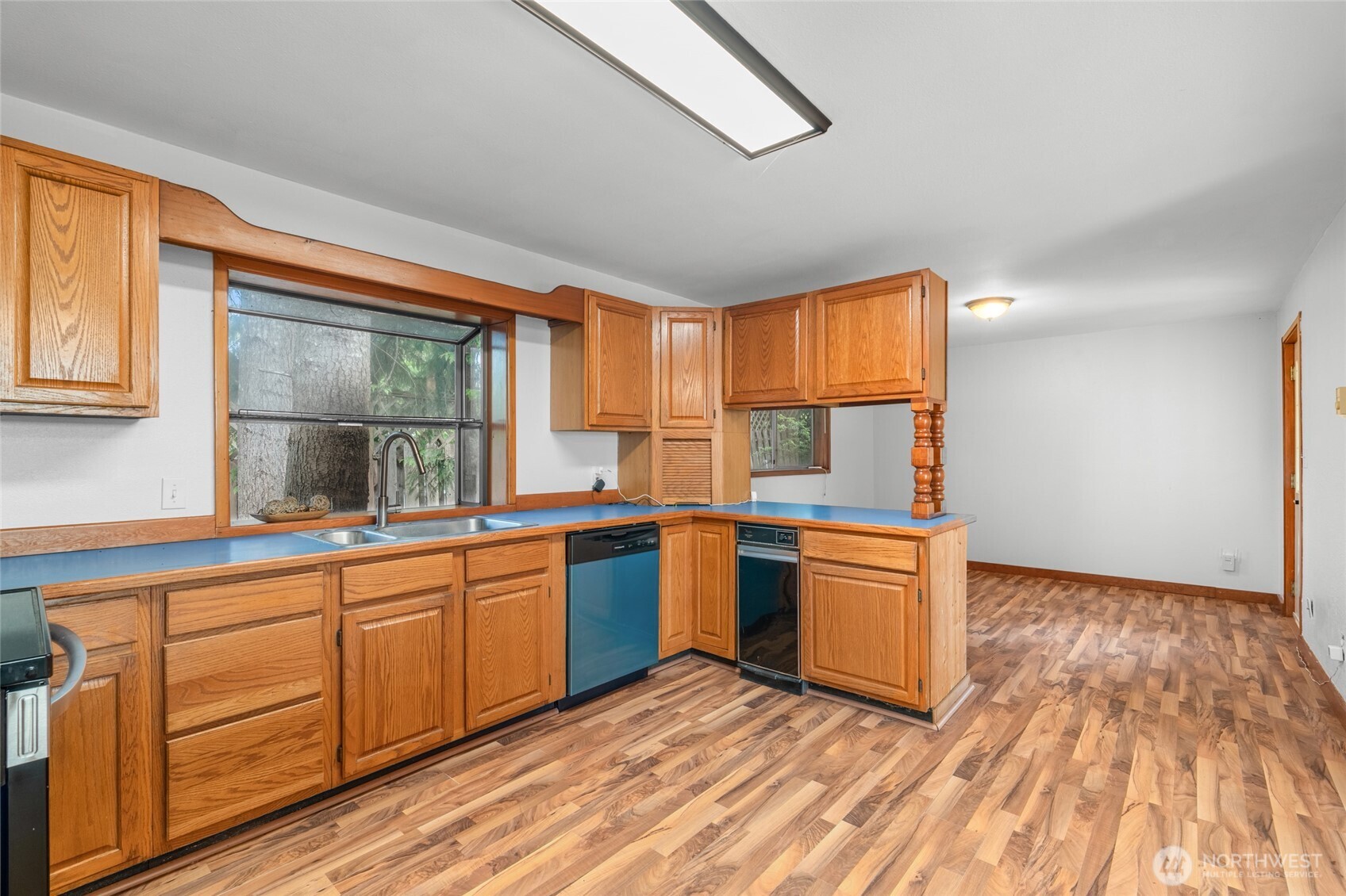 230 East Stavis Road Shelton, WA 98584 - Photo 7 of 35 a kitchen with stainless steel appliances granite countertop a stove and a sink