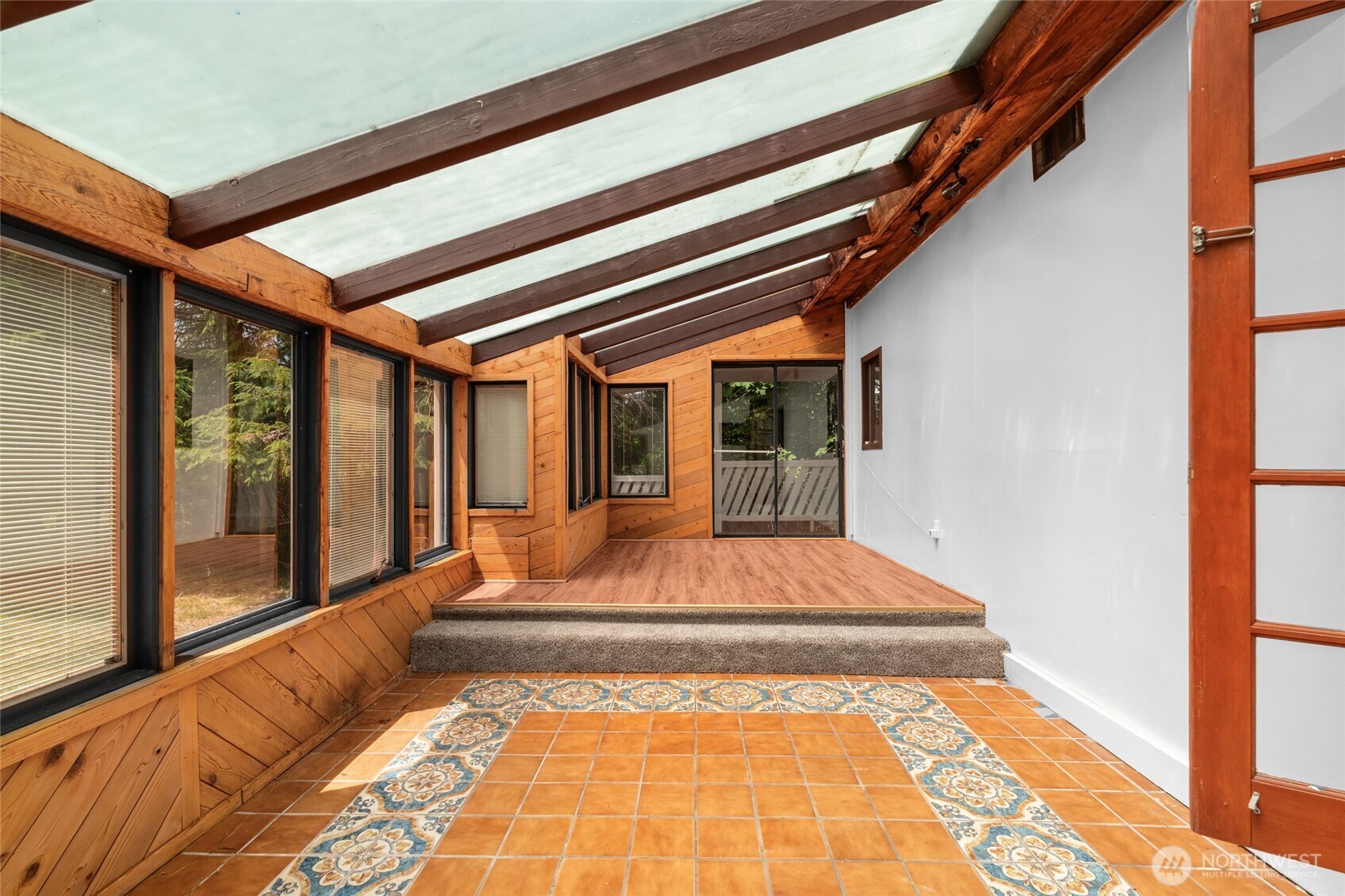 230 East Stavis Road Shelton, WA 98584 - Photo 10 of 35 a bedroom with a large bed and a large window