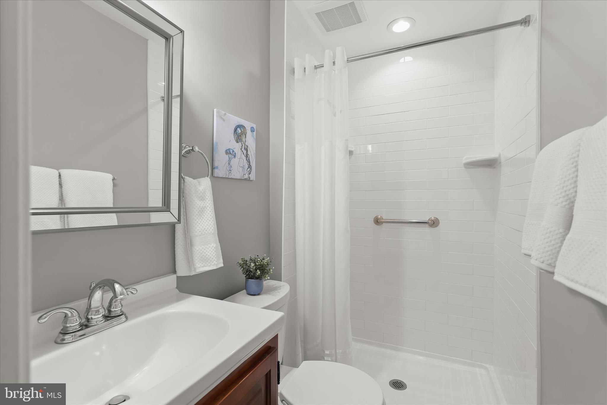 792 Match Point Drive Arnold, MD 21012 - Photo 15 of 43 a bathroom with a sink toilet and shower