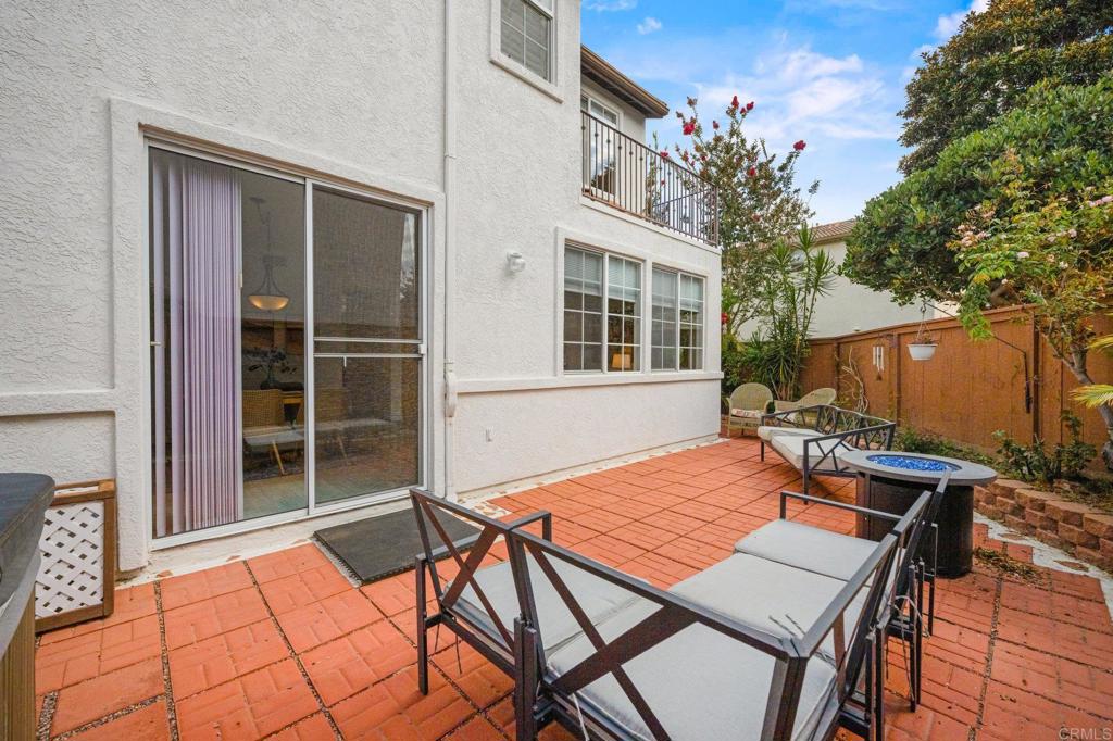 2935 Cliff Circle Carlsbad, CA 92010 - Photo 15 of 17 a backyard of a house with seating space