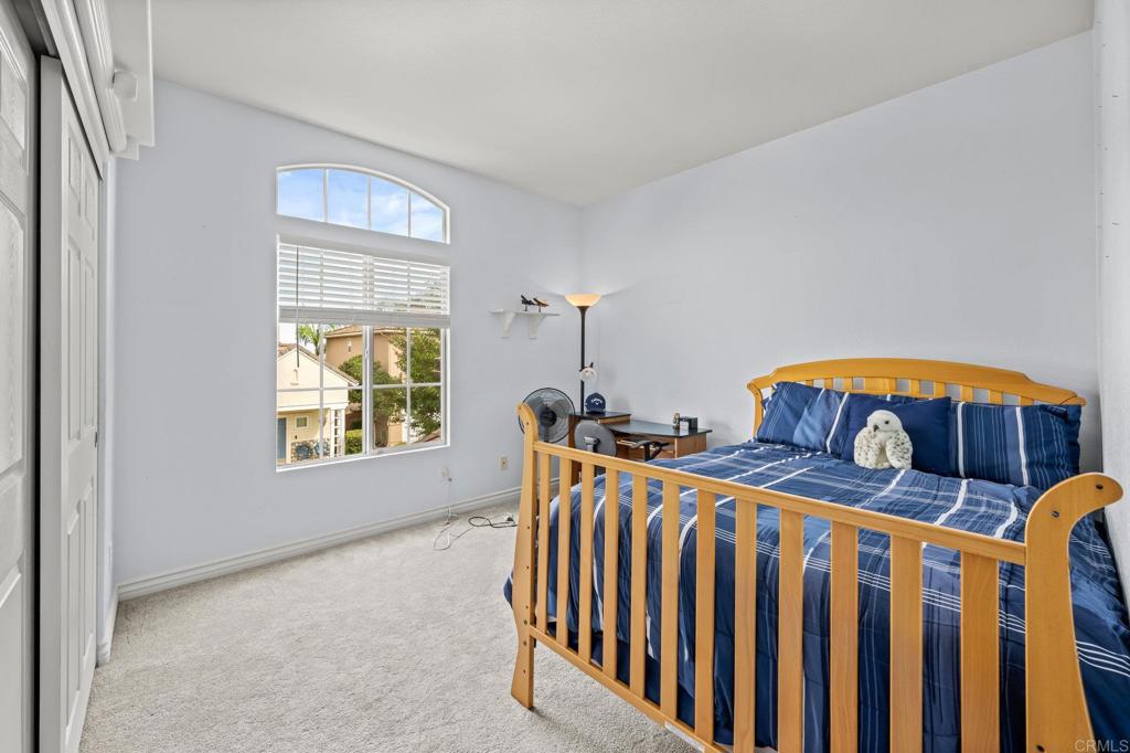 2935 Cliff Circle Carlsbad, CA 92010 - Photo 7 of 17 a bedroom with two beds and a window