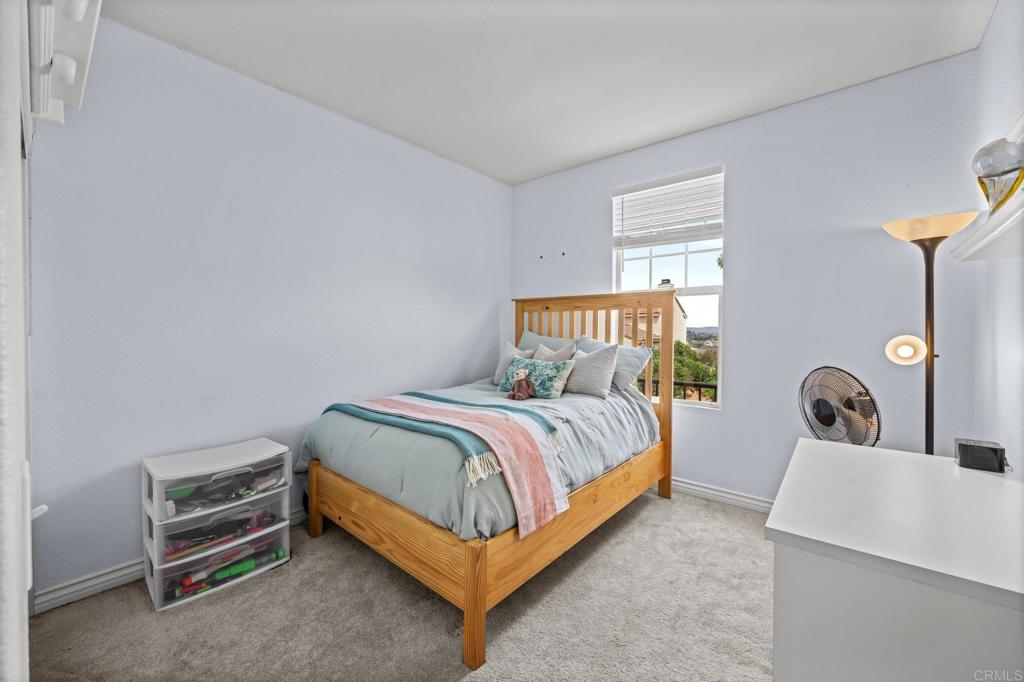 2935 Cliff Circle Carlsbad, CA 92010 - Photo 8 of 17 a bed room with a bed and a dresser