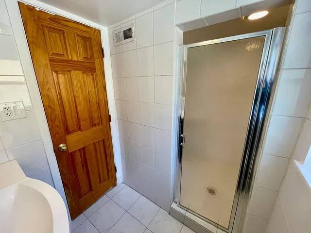 a view of an entryway with a door