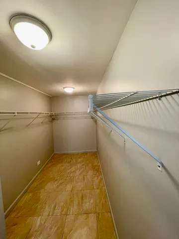 a view of a room with racks on the wall