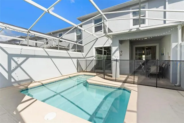 a view of a backyard with a patio