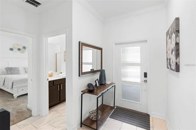 a room with a couch and a window