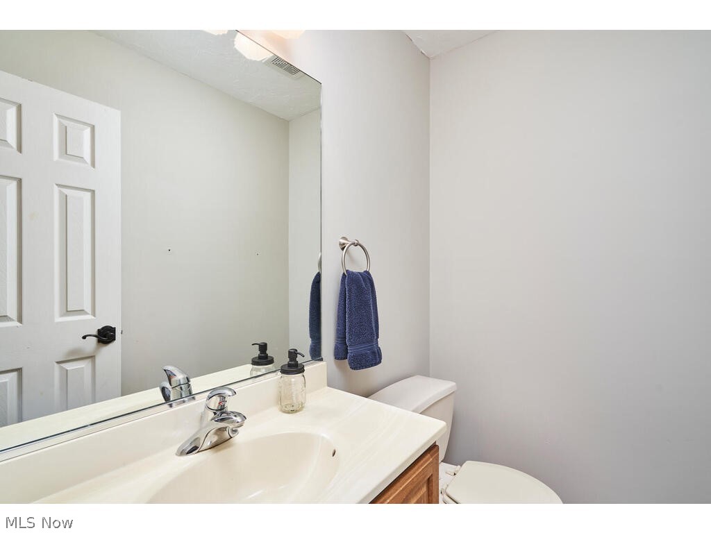 41780 Parsons Road Lagrange, OH 44050 - Photo 9 of 21 Bathroom featuring vanity and toilet