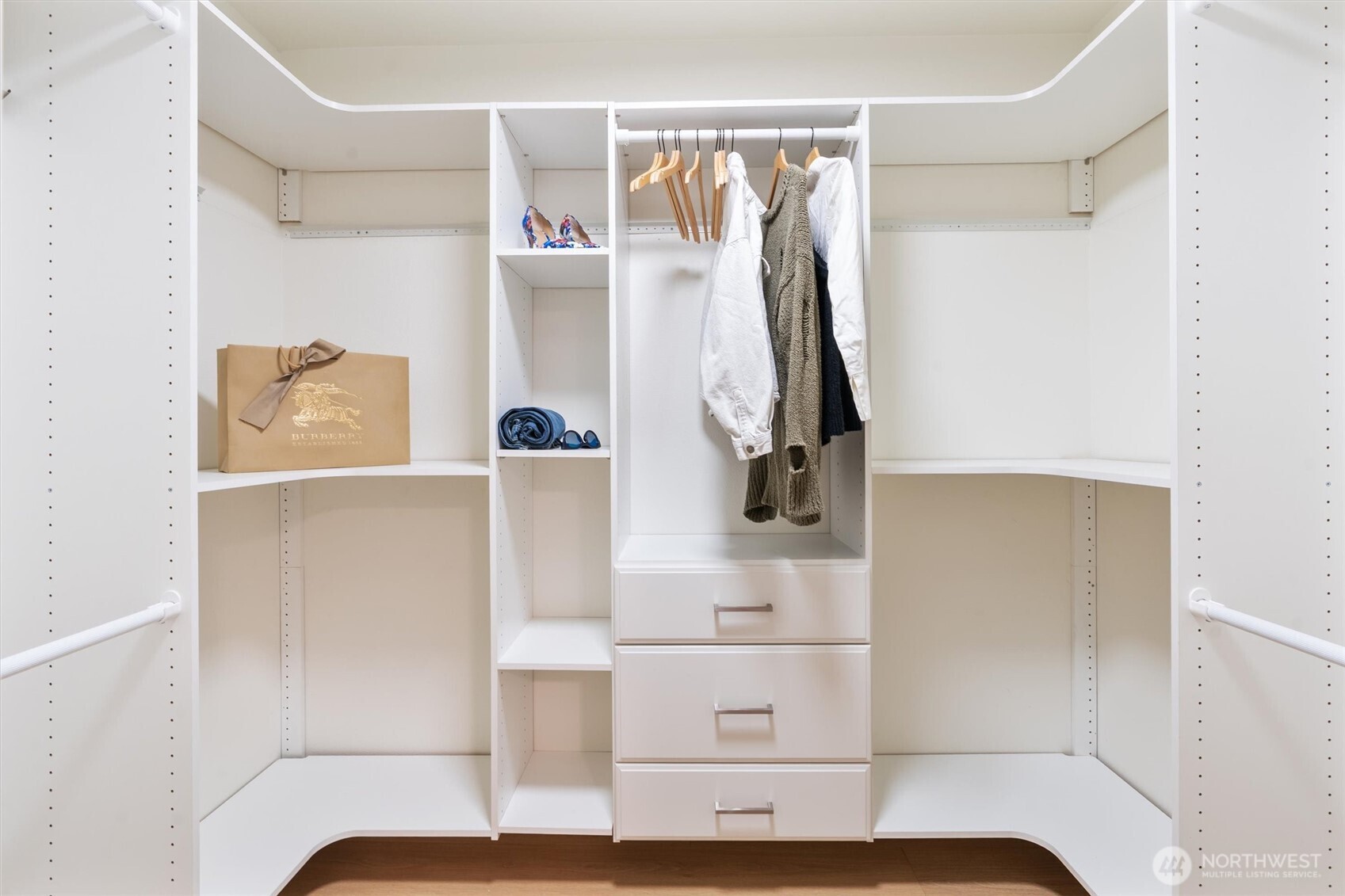 22929 38th Avenue Southeast Bothell, WA 98021 - Photo 14 of 37 a view of walk in closet with clothes and shoes