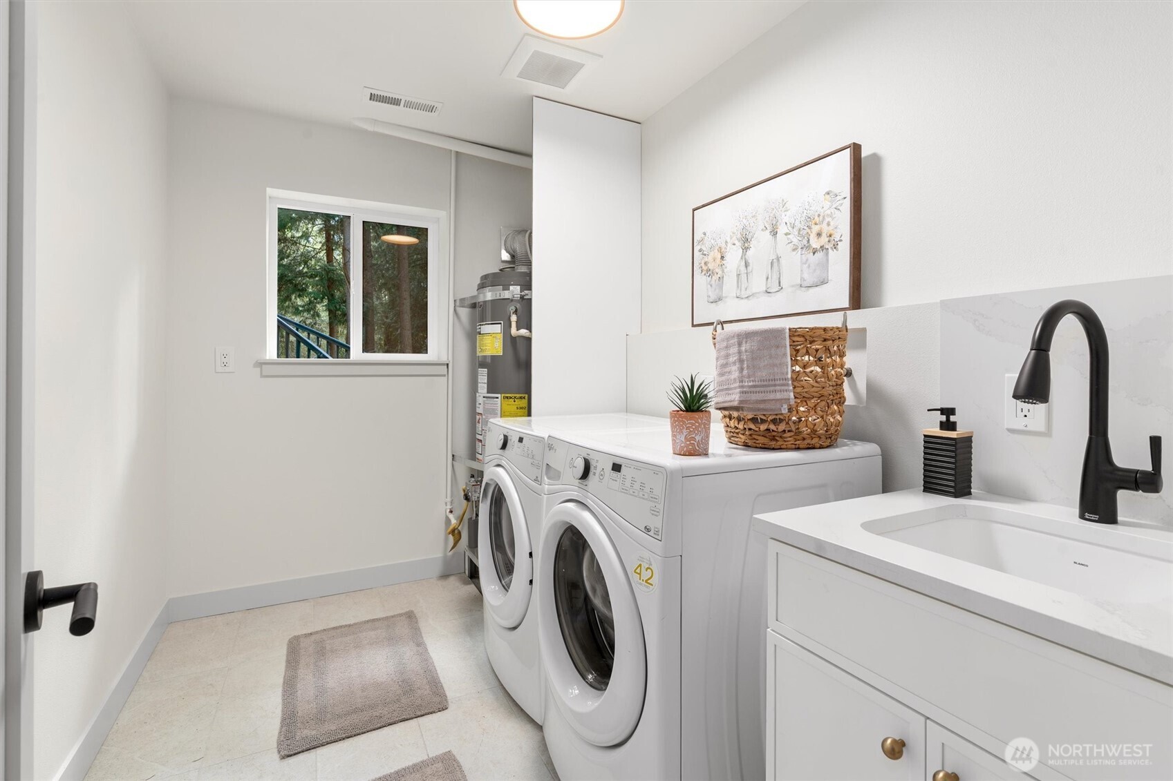 22929 38th Avenue Southeast Bothell, WA 98021 - Photo 19 of 37 a utility room with dryer and washer