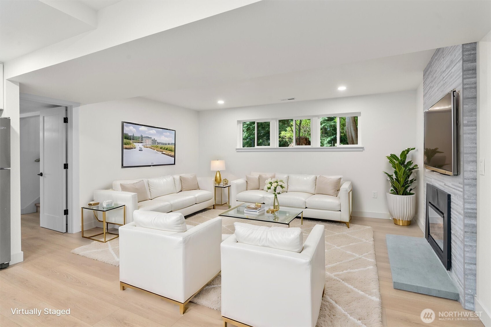 22929 38th Avenue Southeast Bothell, WA 98021 - Photo 21 of 37 a living room with furniture and a potted plant