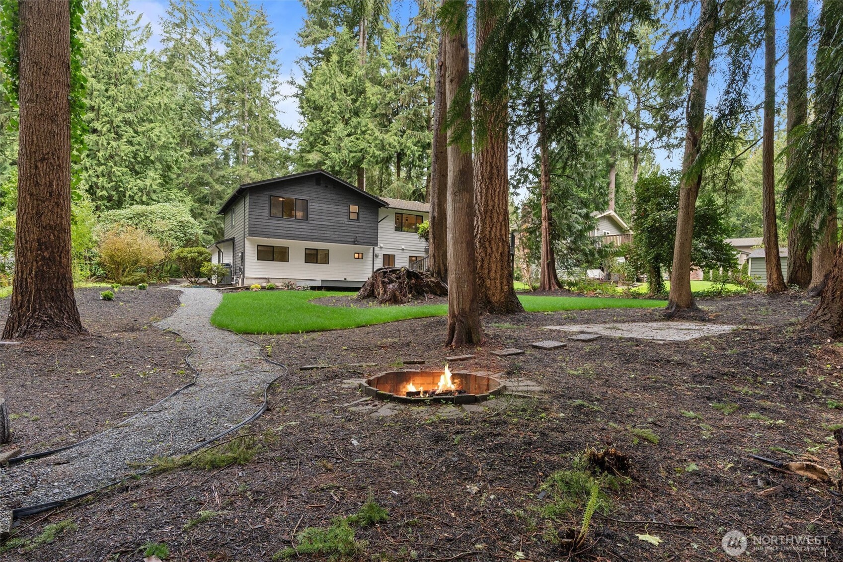 22929 38th Avenue Southeast Bothell, WA 98021 - Photo 28 of 37 a front view of a house with a yard