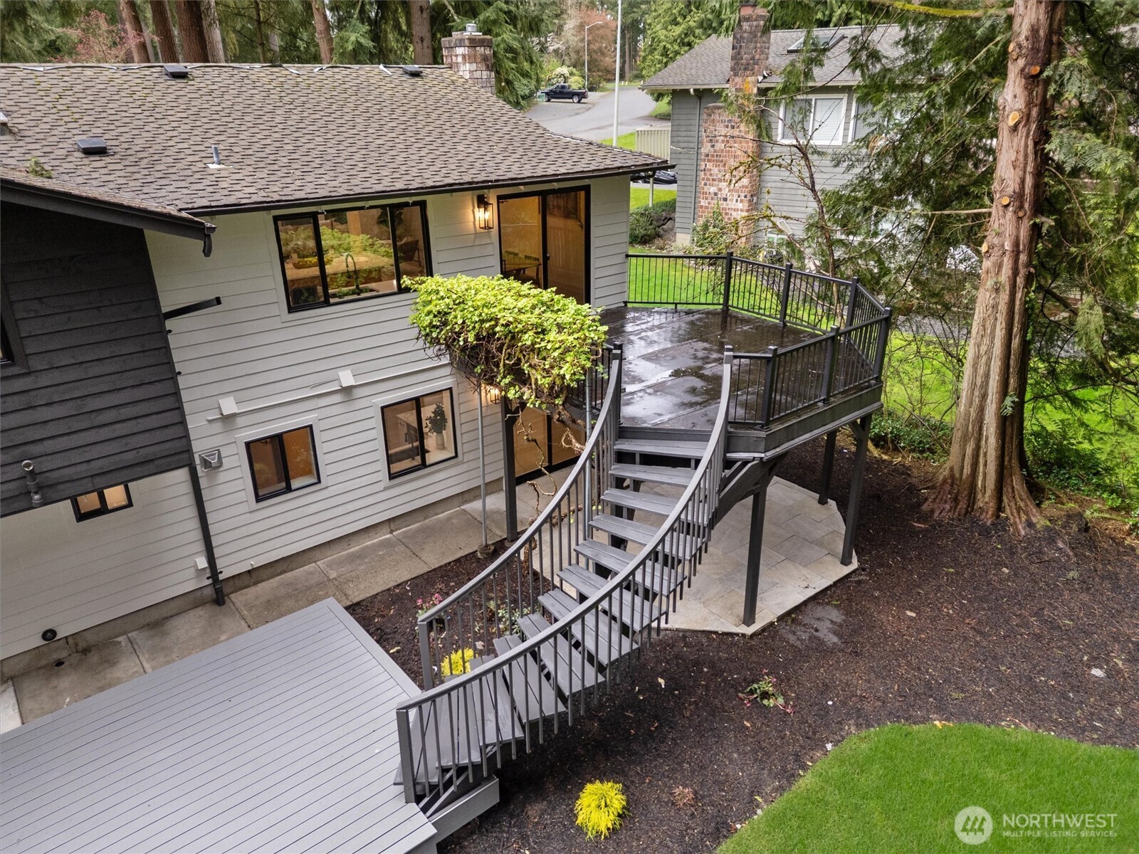 22929 38th Avenue Southeast Bothell, WA 98021 - Photo 29 of 37 a front view of a house with garden