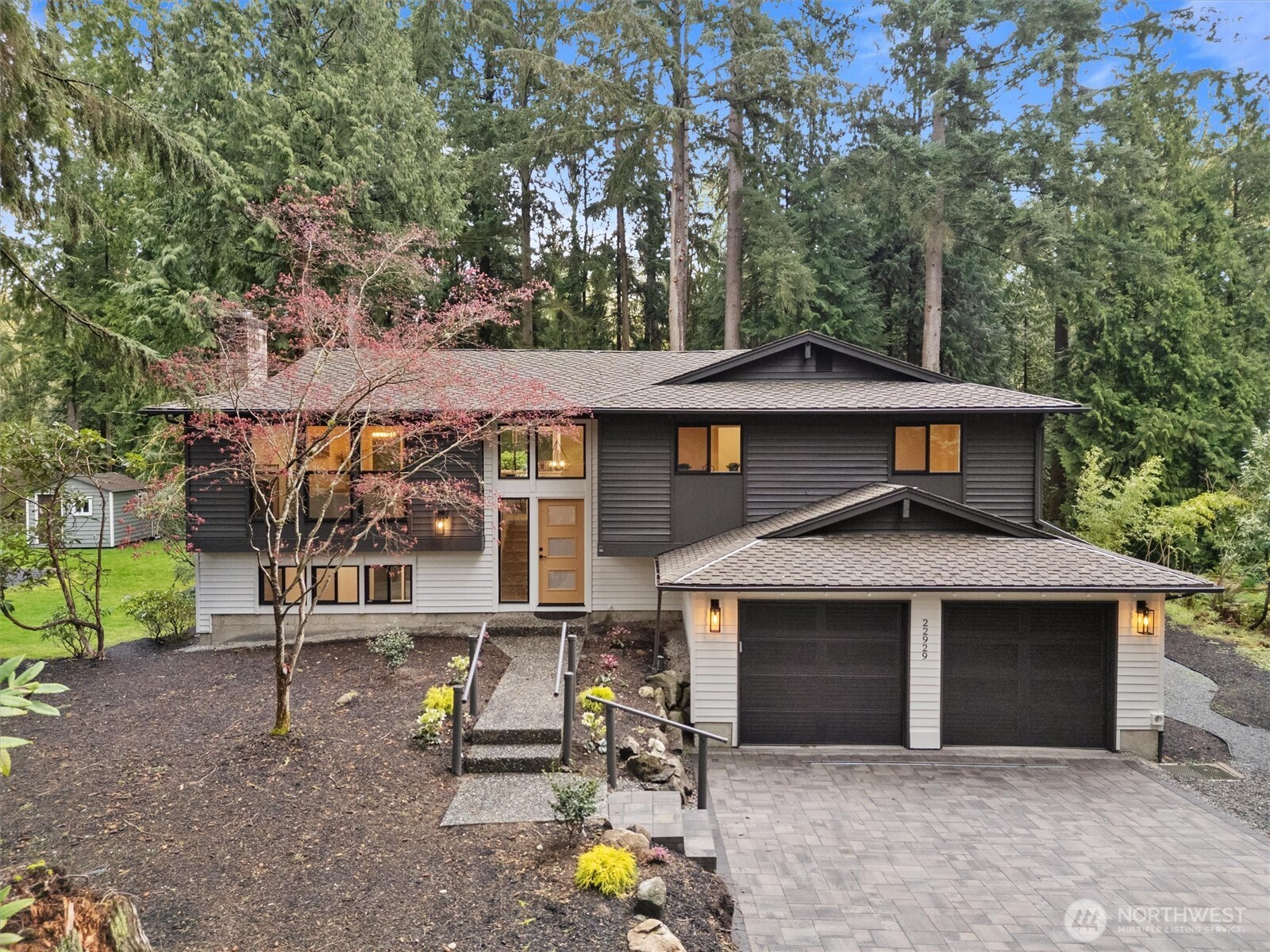 22929 38th Avenue Southeast Bothell, WA 98021 - Photo 30 of 37 front view of a house with a garden
